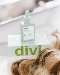 divi hair product next to the hair lock